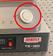 Tip lowering knob on Cypher AFM. Turn Clockwise to raise the tip and turn counter-clockwise to lower the tip.